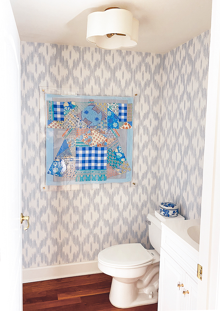 keller ogee blue ikat wallpaper, scalloped light, hermes scarf frame, serena and lily lanai mirror, bamboo mirror, blue and white powder bath, bathroom renovation