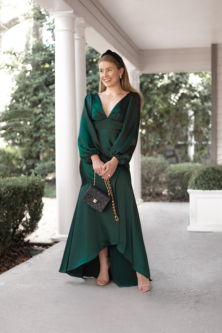 long sleeve green evening gown, black velvet lele sadoughi headband, pearl hoop earrings